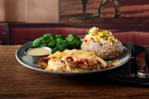 Juicy ALICE SPRINGS CHICKEN seasoned and cooked to golden perfection at Outback Steakhouse