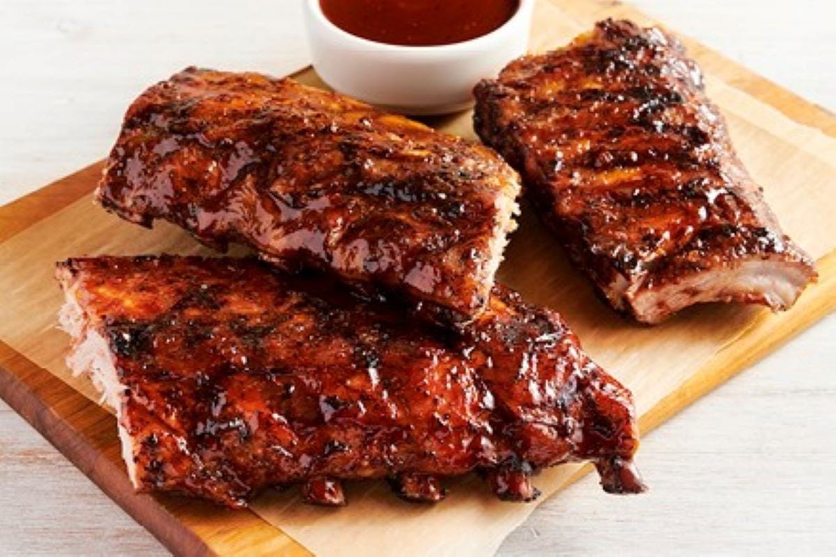 Fall-off-the-bone BABY BACK RIBS PARTY PLATTER slow-cooked and glazed with tangy BBQ sauce