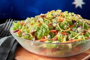 Fresh and crisp BLUE CHEESE PECAN CHOPPED SIDE SALAD with premium ingredients and house-made dressing