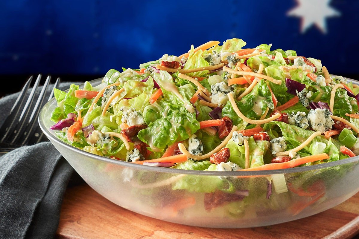 Fresh and crisp BLUE CHEESE PECAN CHOPPED SIDE SALAD with premium ingredients and house-made dressing