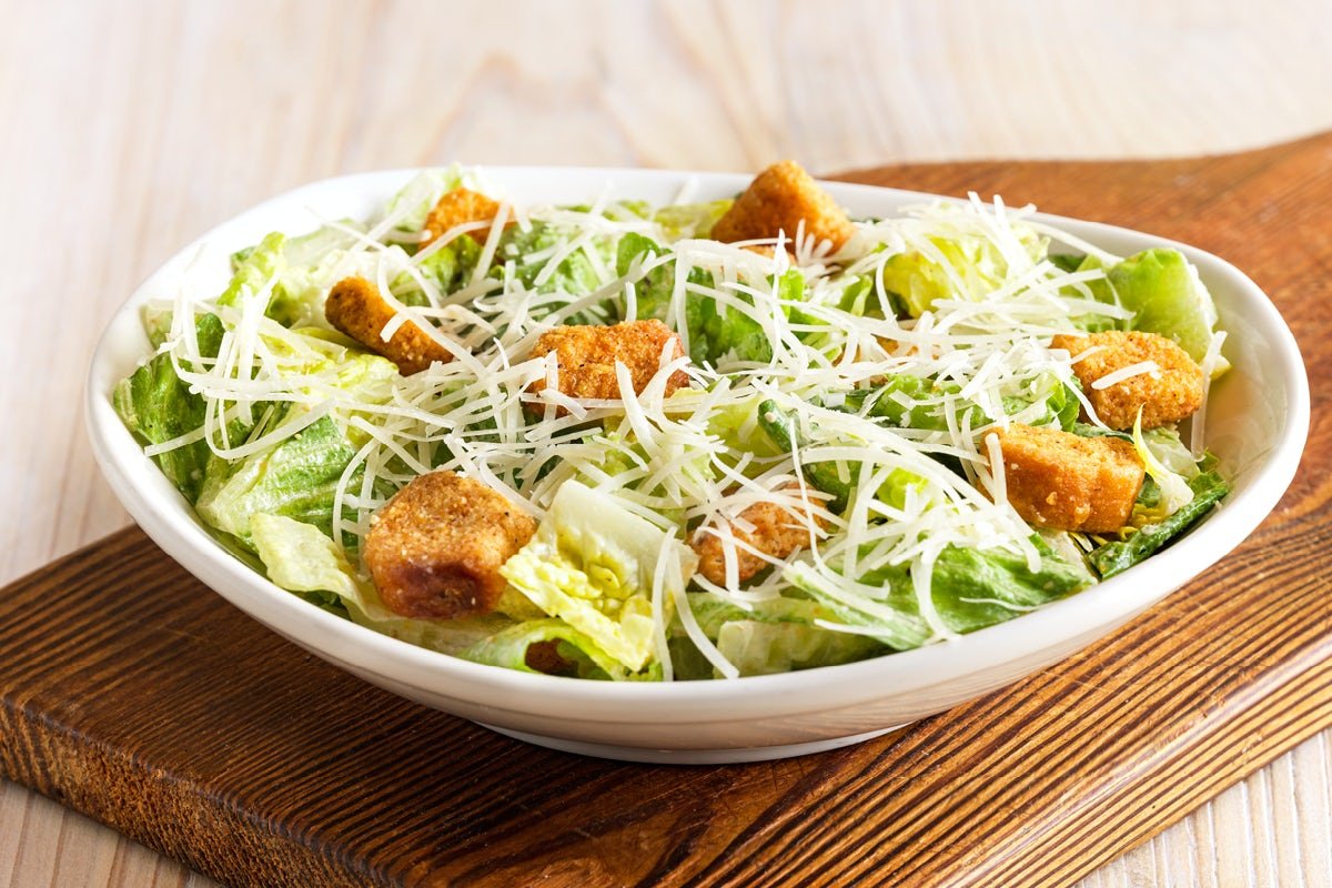 Fresh and crisp CAESAR SIDE SALAD with premium ingredients and house-made dressing