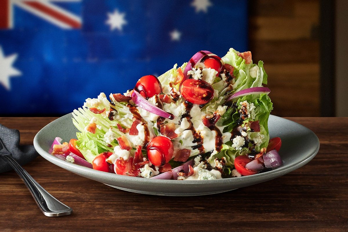 Fresh and crisp CLASSIC BLUE CHEESE WEDGE SIDE SALAD with premium ingredients and house-made dressing