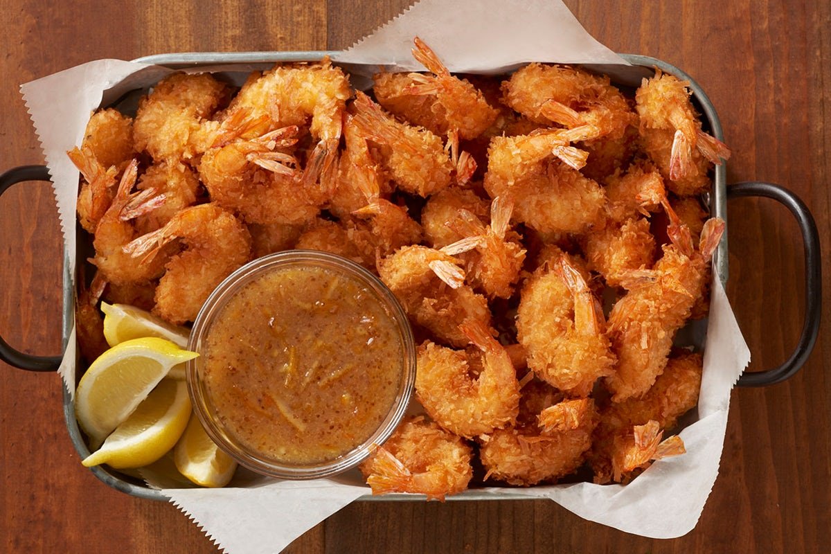 Fresh GOLD COAST COCONUT SHRIMP PARTY PLATTER prepared with coastal flavors and served with our signature sauces