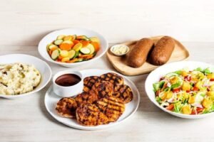 Juicy GRILLED CHICKEN FOR 4 seasoned and cooked to golden perfection at Outback Steakhouse