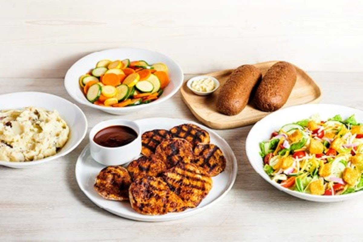 Juicy GRILLED CHICKEN FOR 4 seasoned and cooked to golden perfection at Outback Steakhouse