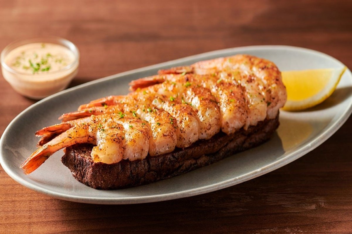 Fresh GRILLED SHRIMP ON THE BARBIE prepared with coastal flavors and served with our signature sauces
