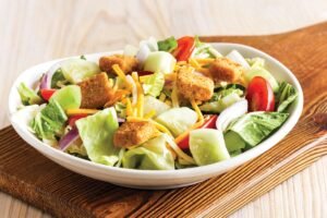 Fresh and crisp HOUSE SIDE SALAD with premium ingredients and house-made dressing