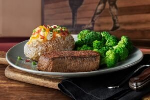 OUTBACK CENTER-CUT SIRLOIN grilled to perfection with Outback signature seasoning