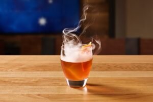 SMOKED CINNAMON PECAN OLD FASHIONED served fresh at Outback Steakhouse with authentic Australian-inspired flavors